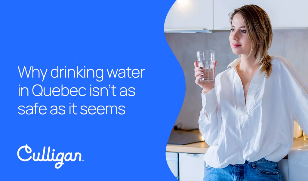 drinking water safety, water quality in Quebec, woman holding a glass of water, Culligan water filtration, drinking water risks, purifying tap water, kitchen water solutions, Culligan home solutions.
